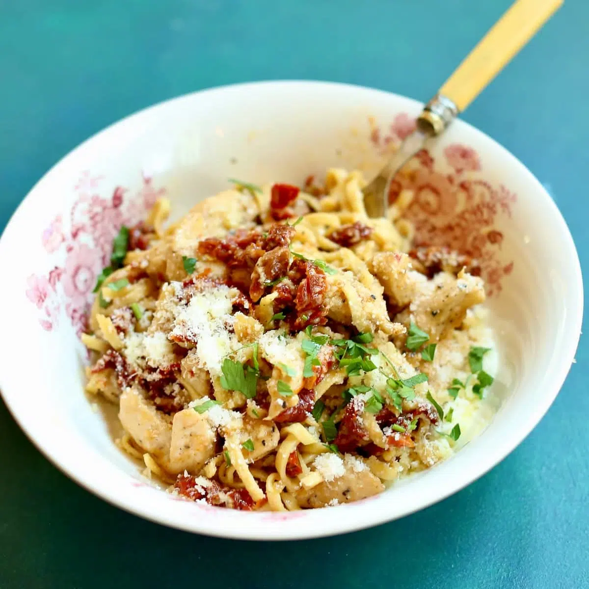 a square photo of sun dried tomato pasta.