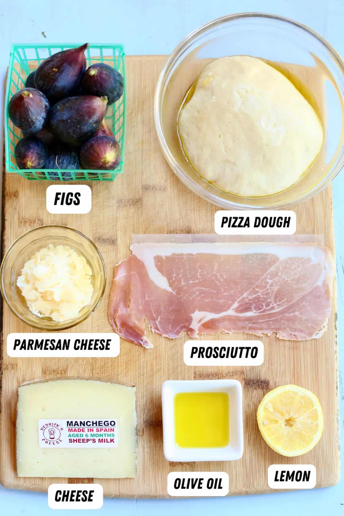 a tray of ingredients labeled for fig pizza.