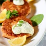 a close up photo of salmon patties with a text overlay saying the recipe name.