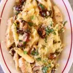 a plate of pasta with a text overlay saying the recipe name.