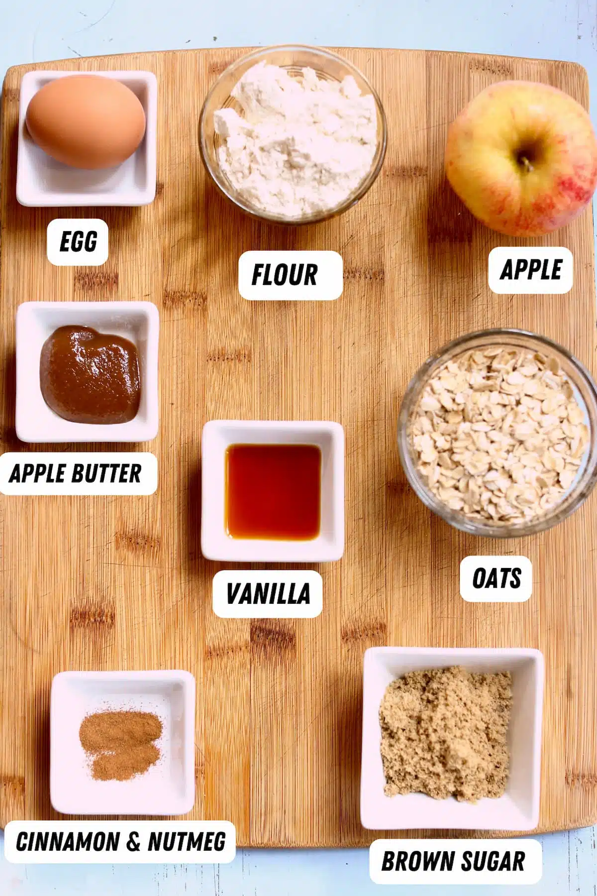 a cutting board with cookie ingredients on it.