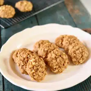 a white platter with cookies on it, a square image.