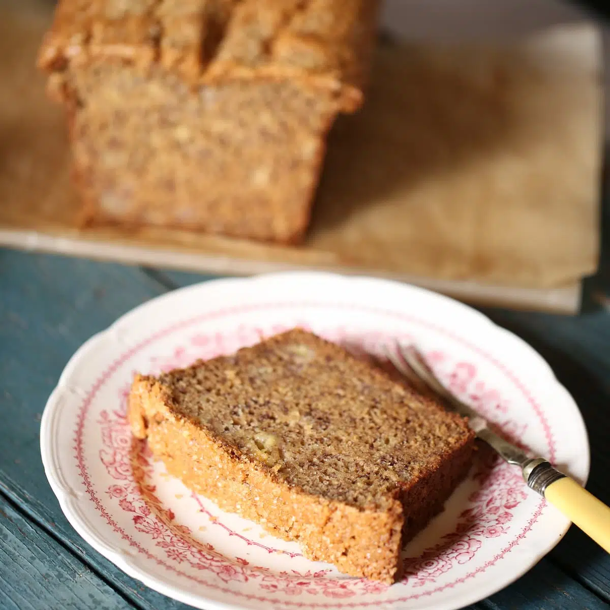 a piece of banana bread on a plate.