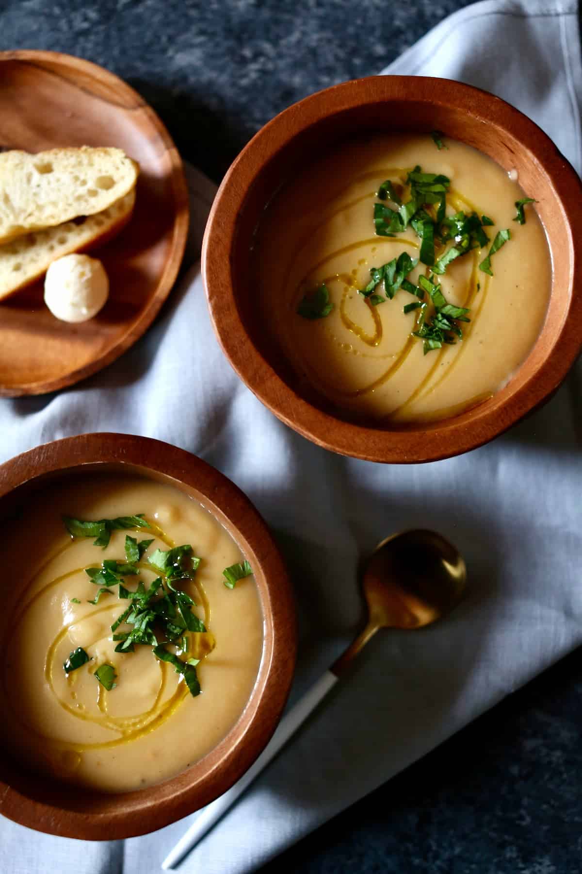 a close up photo of two bowls of soup.