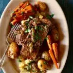 an overhead photo of pot roast with text overlay saying the recipe name.