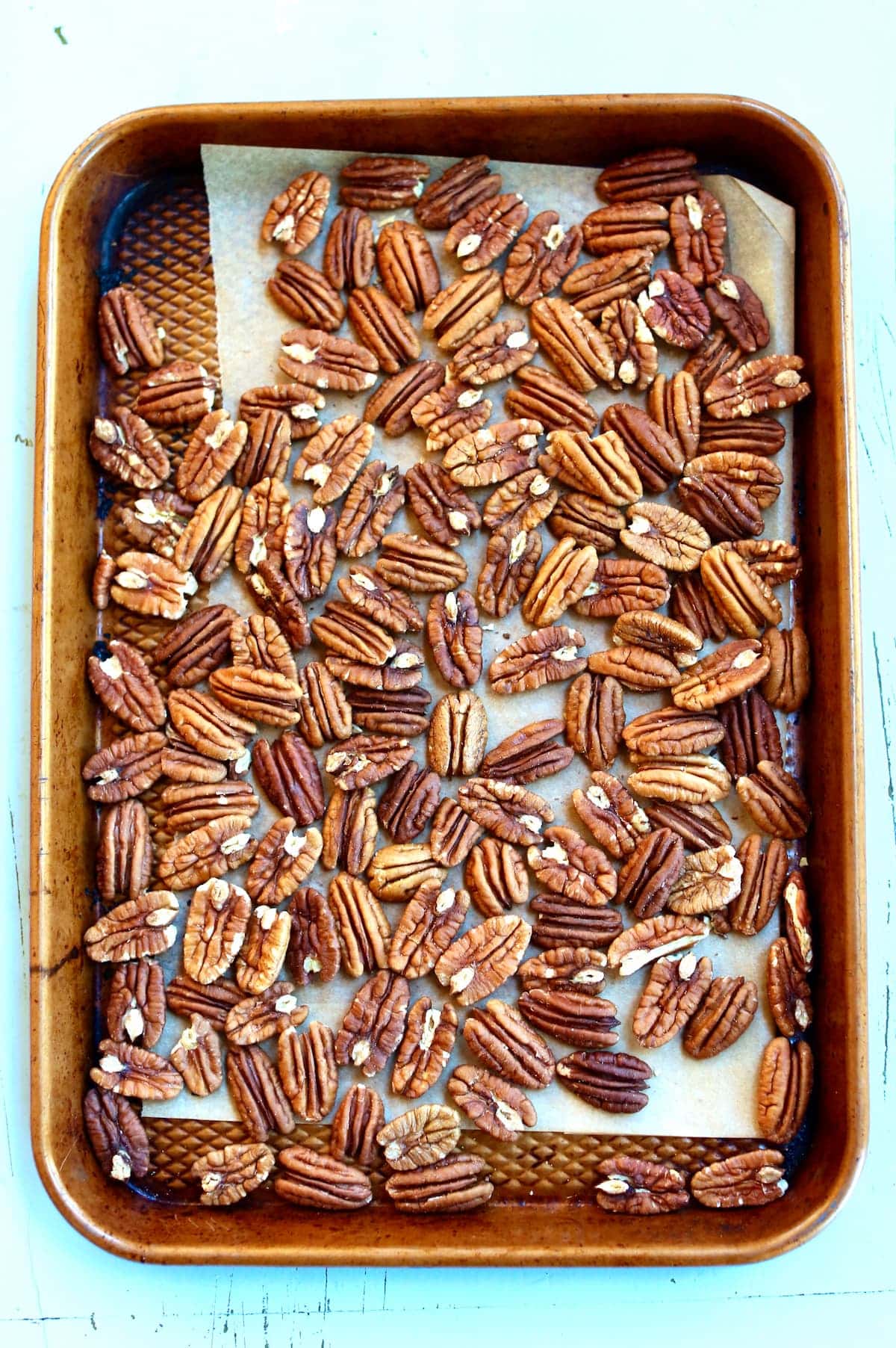 a baking sheet of toasted pecans.