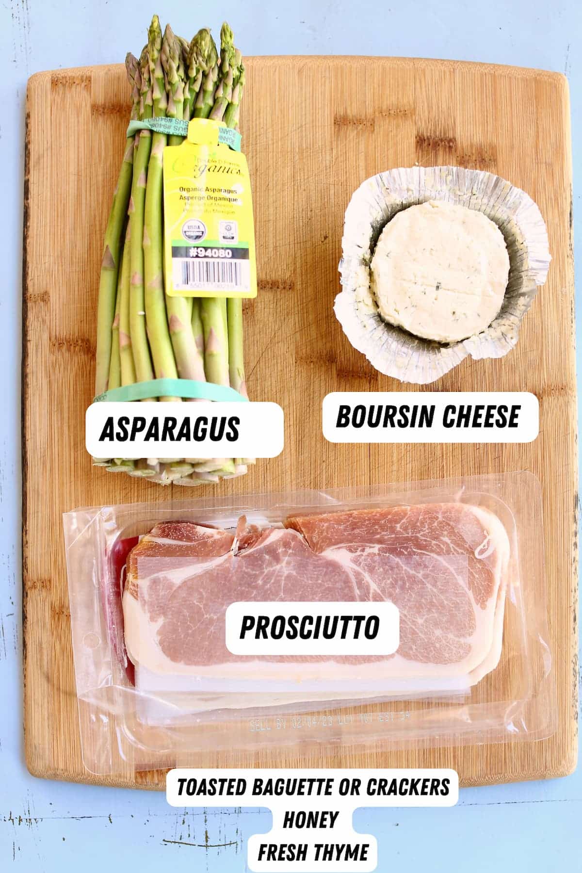 a cutting board of ingredients for appetizers.