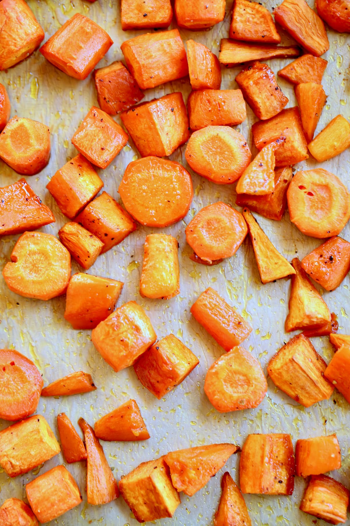 roasted carrots on a baking sheet pan.