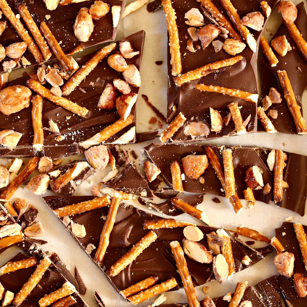 a close up photo of chocolate bark and pretzels.