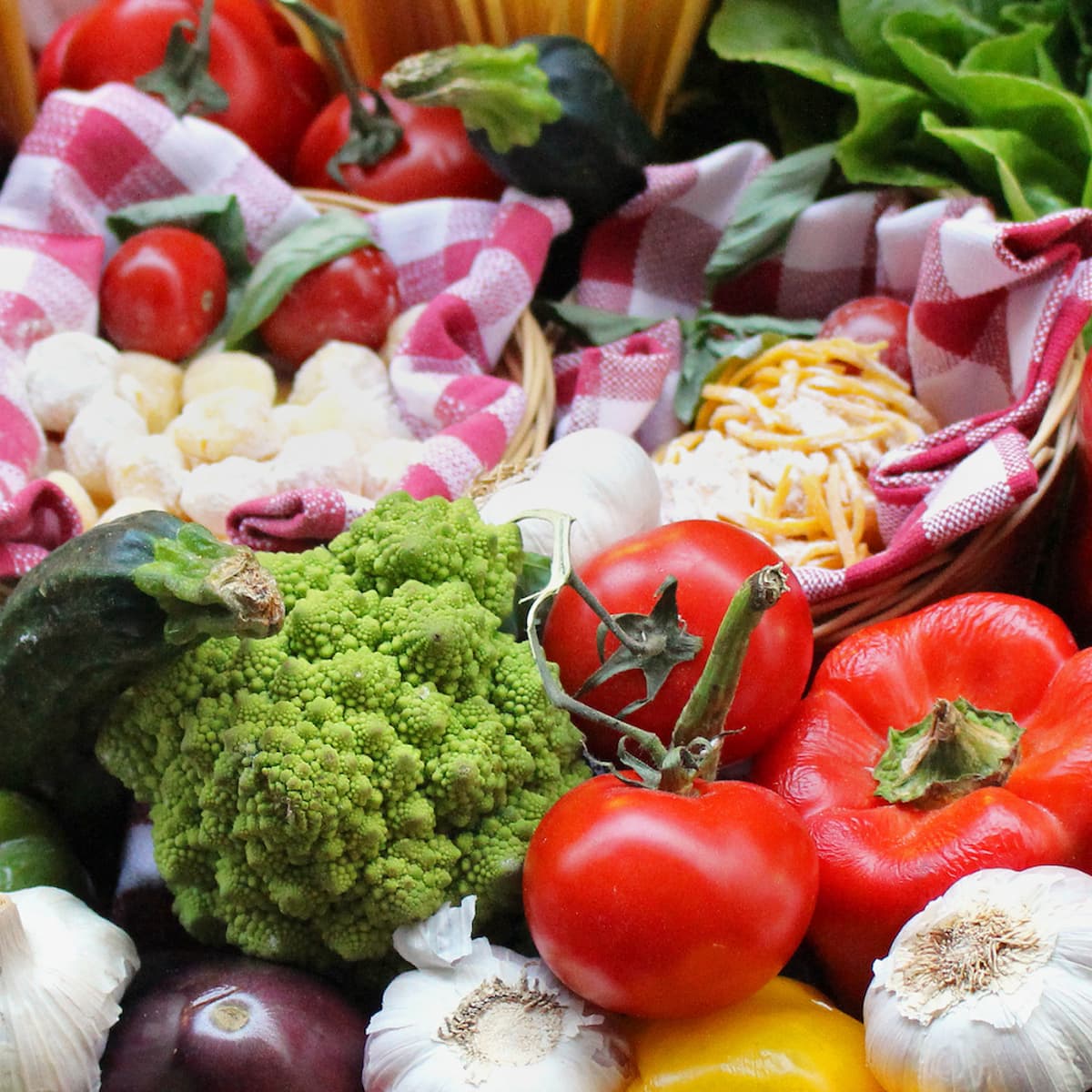 a square photo of fruits and vegetables.