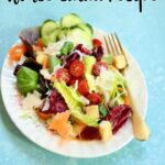 an image of a salad on a blue table.