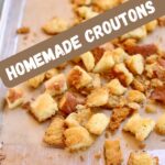 a sheet pan of croutons, with text overlay saying the recipe name.