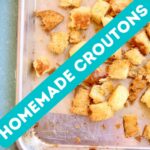 a sheet pan of croutons wite text overlay.