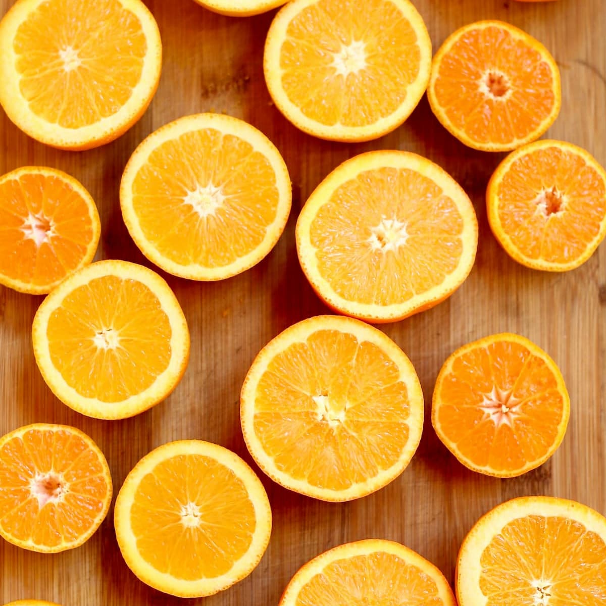 a table with cut oranges.
