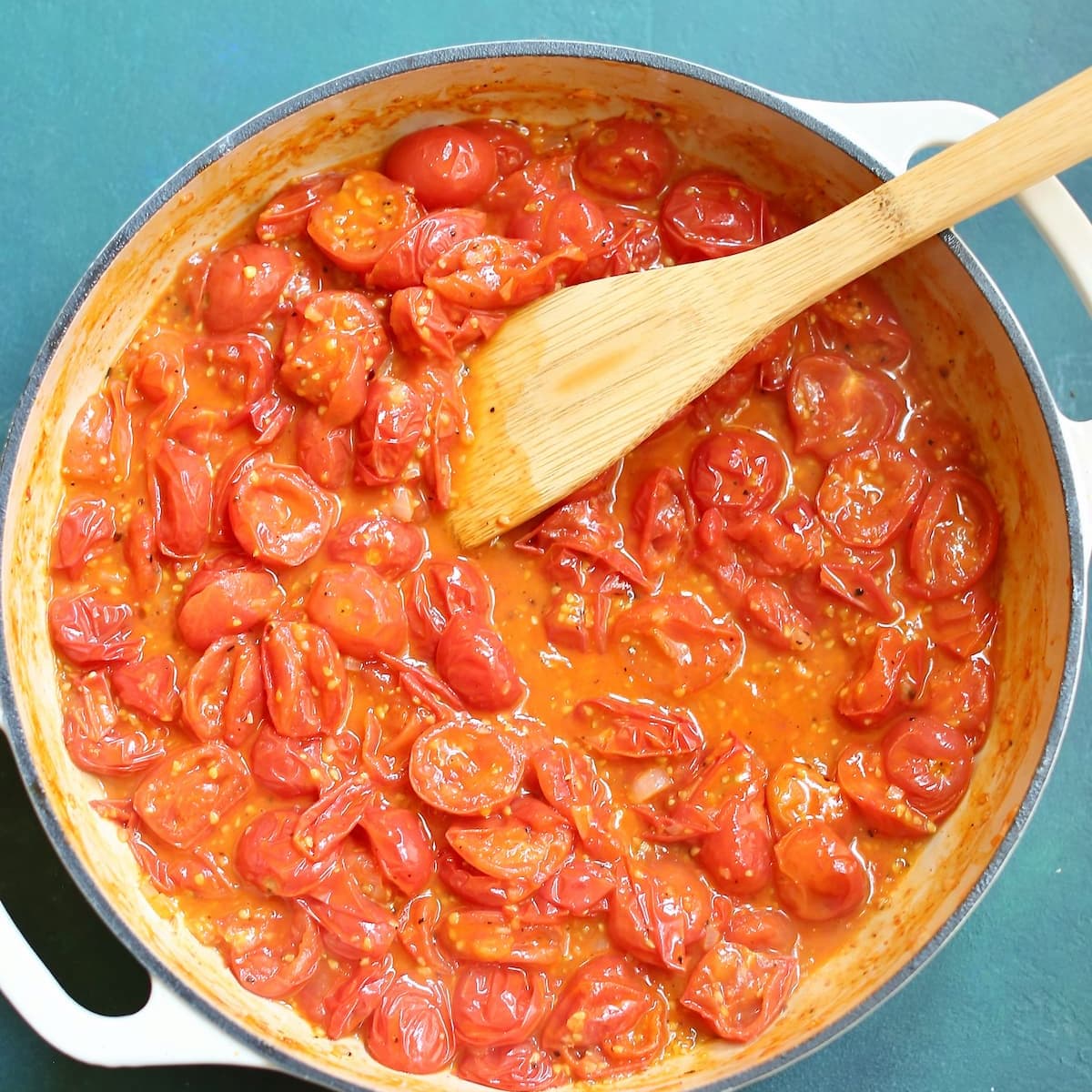 a square image of a pot of tomato sauce.
