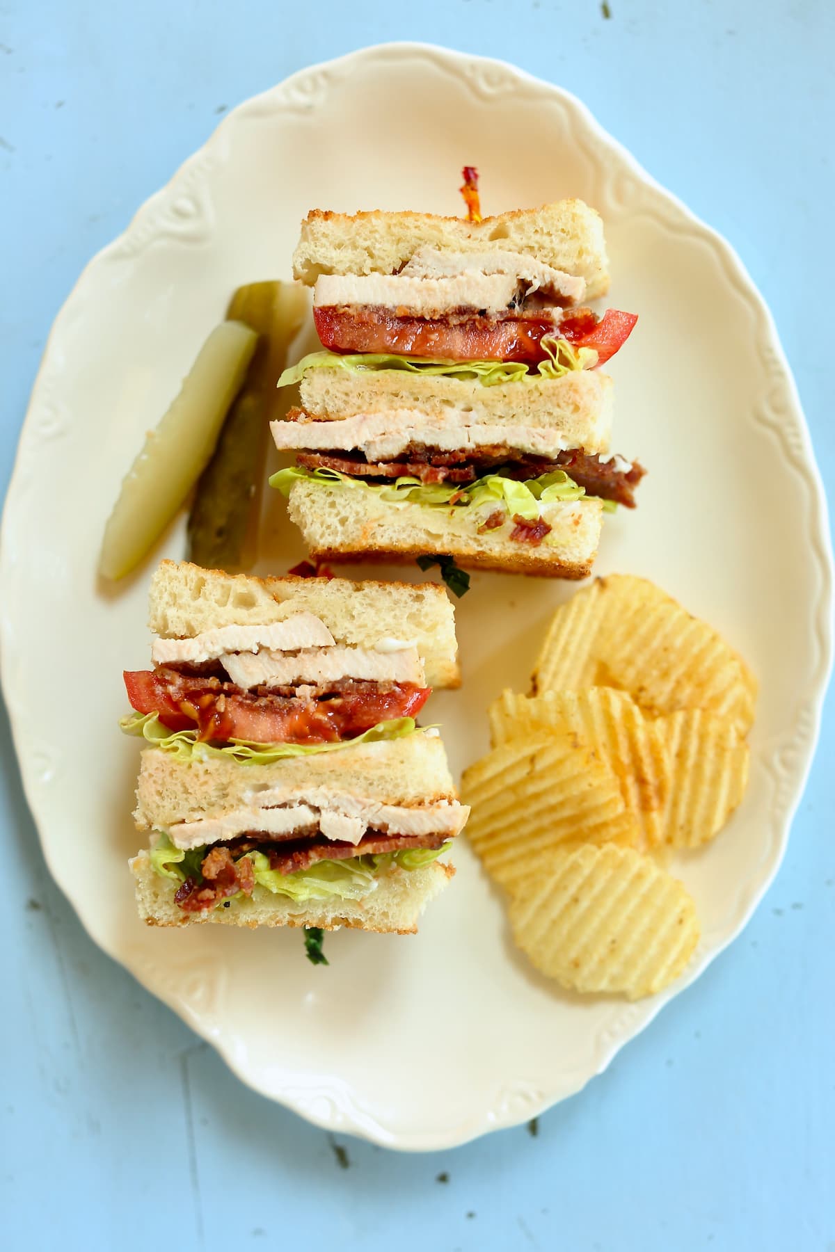 an overhead photo of a club sandwich. 