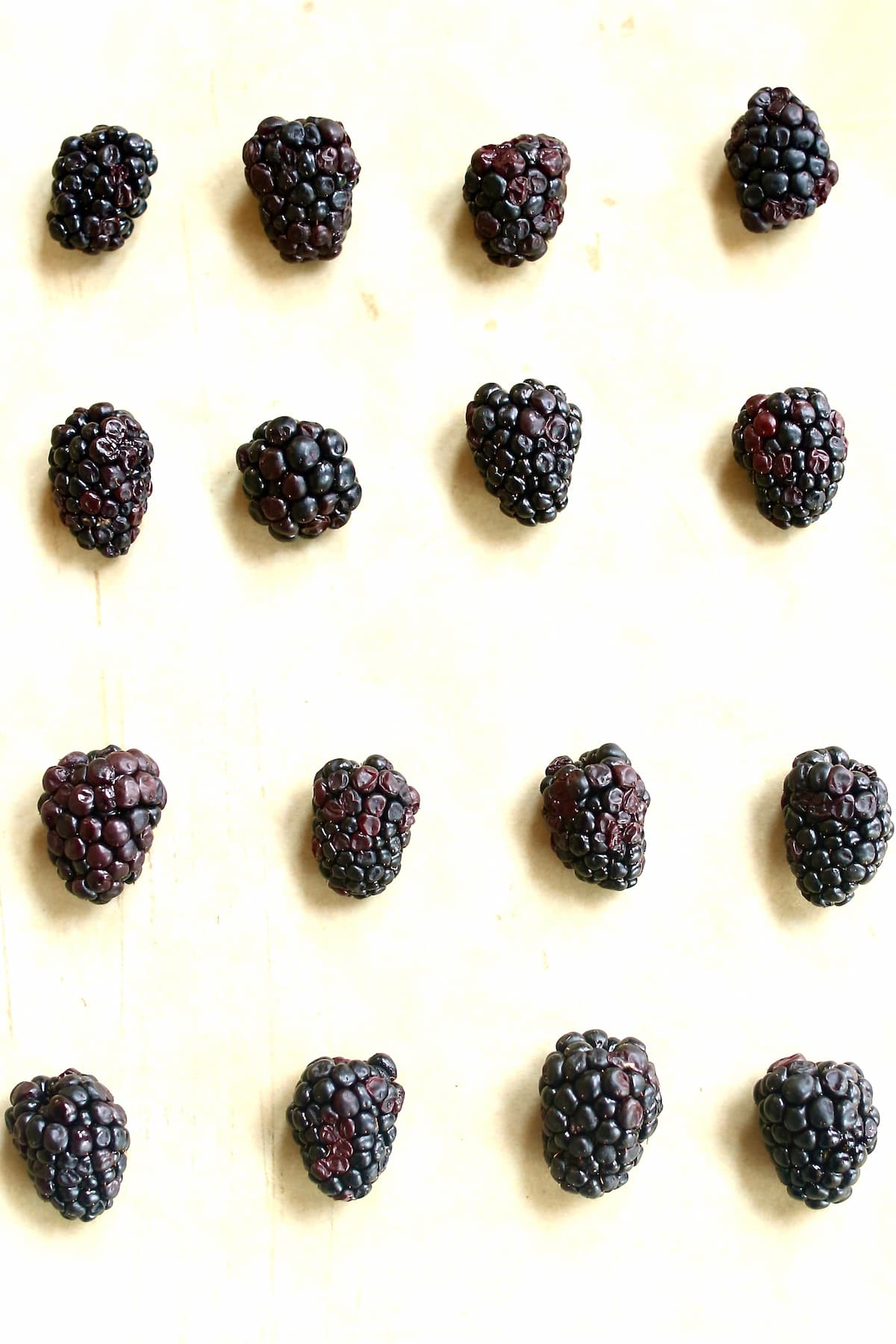 an overhead photo of blackberries on a table.  