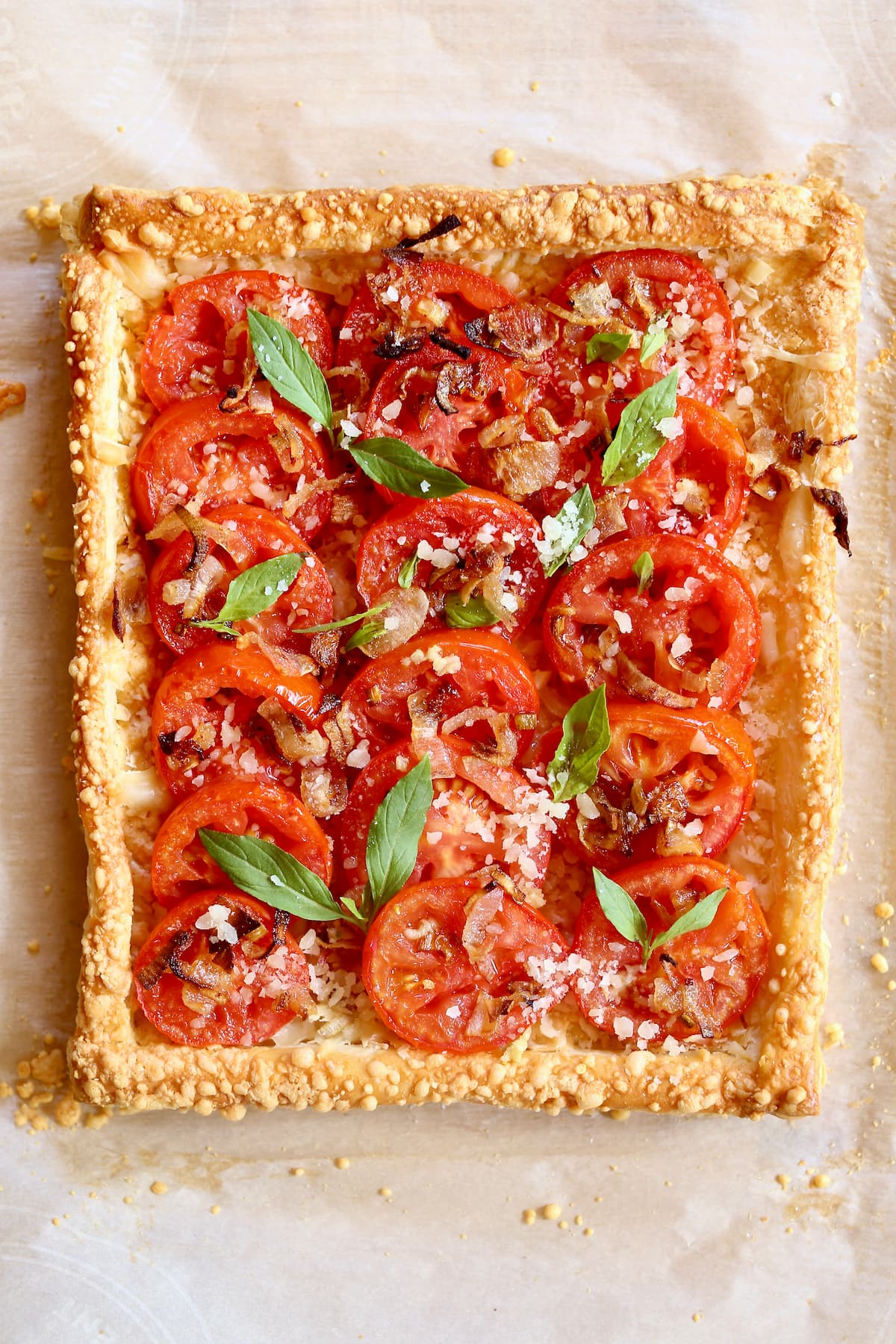 a whole tomato tart on a table.