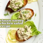 A Pinterest image of chicken salad toasts on a white platter.