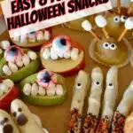 a pinterest image of fruit halloween snacks.